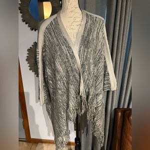 Soft bell sleeve sweater wrap.